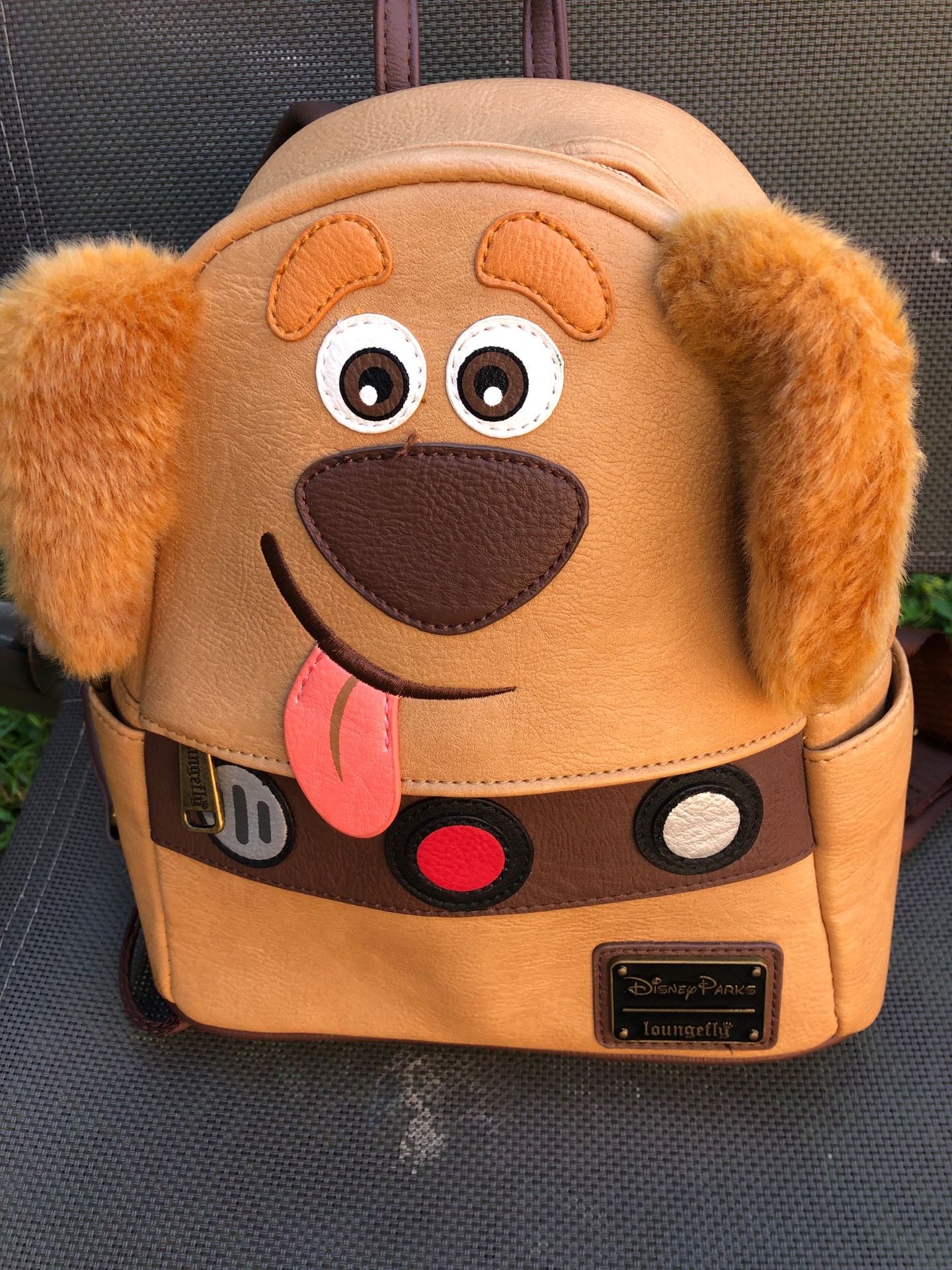 Loungefly Doug. Tan Back Pack Disney Pixar