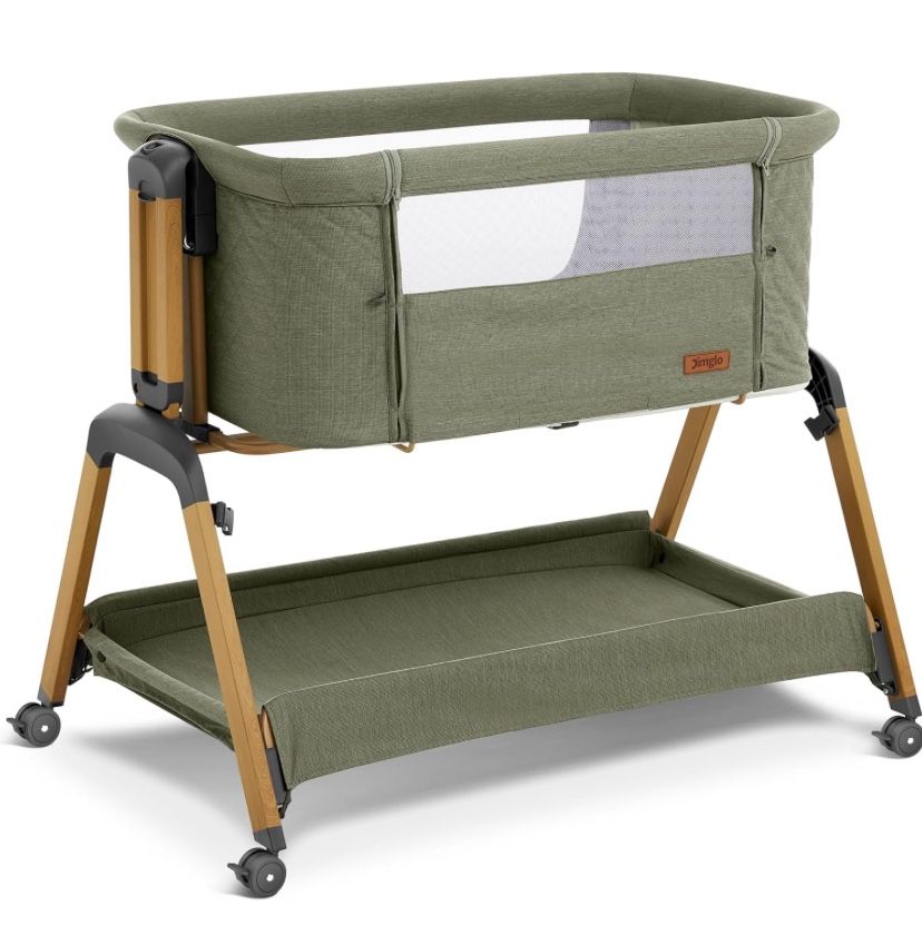 Three and one Bedside Sleeper Rocking Bassinet(MONROVIA) Like New