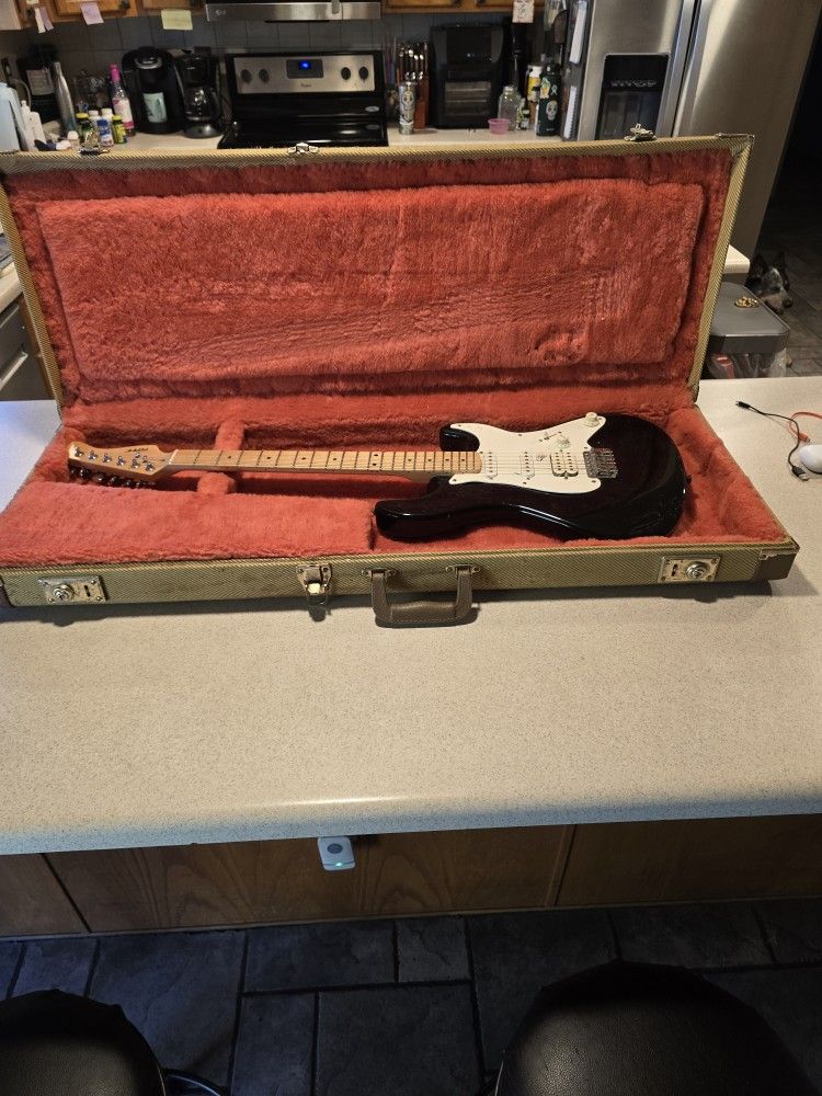 Electric Guitar And Case