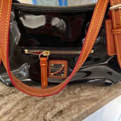 Brand New Dooney And Bourke Patent Leather Bag With Matching Wristlet 