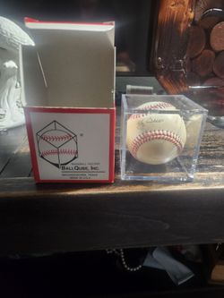 Yogi Berra sign ball with a  certificate of authenticity