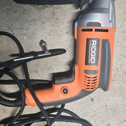 Rigid 
8 Amp Corded 1/2 in. Heavy-Duty Variable Speed Reversible Drill