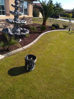 Concrete curbing sprinklers and sod