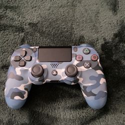 blue cami ps4 controller i don’t use it and it’s brand new no stick drift or anything 