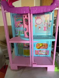 Chelsea Barbie doll house with elevator and slide