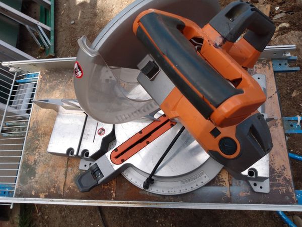 Ridgid 12 inch dual bevel miter saw with adjustable laser guide for