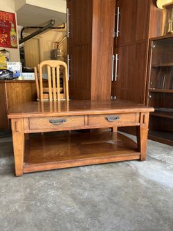 wood coffee table with hidden wheels