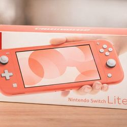Nintendo Switch Lite – Coral – With Original Box – Great Condition