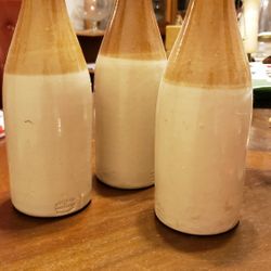 Set of four Vintage Ceramic Ginger Beer Bottles