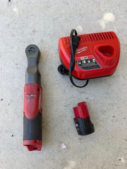 Milwaukee 1/2” RATCHET 12v battery and charger asking $200