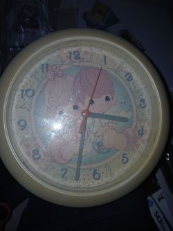 Precious moment clock