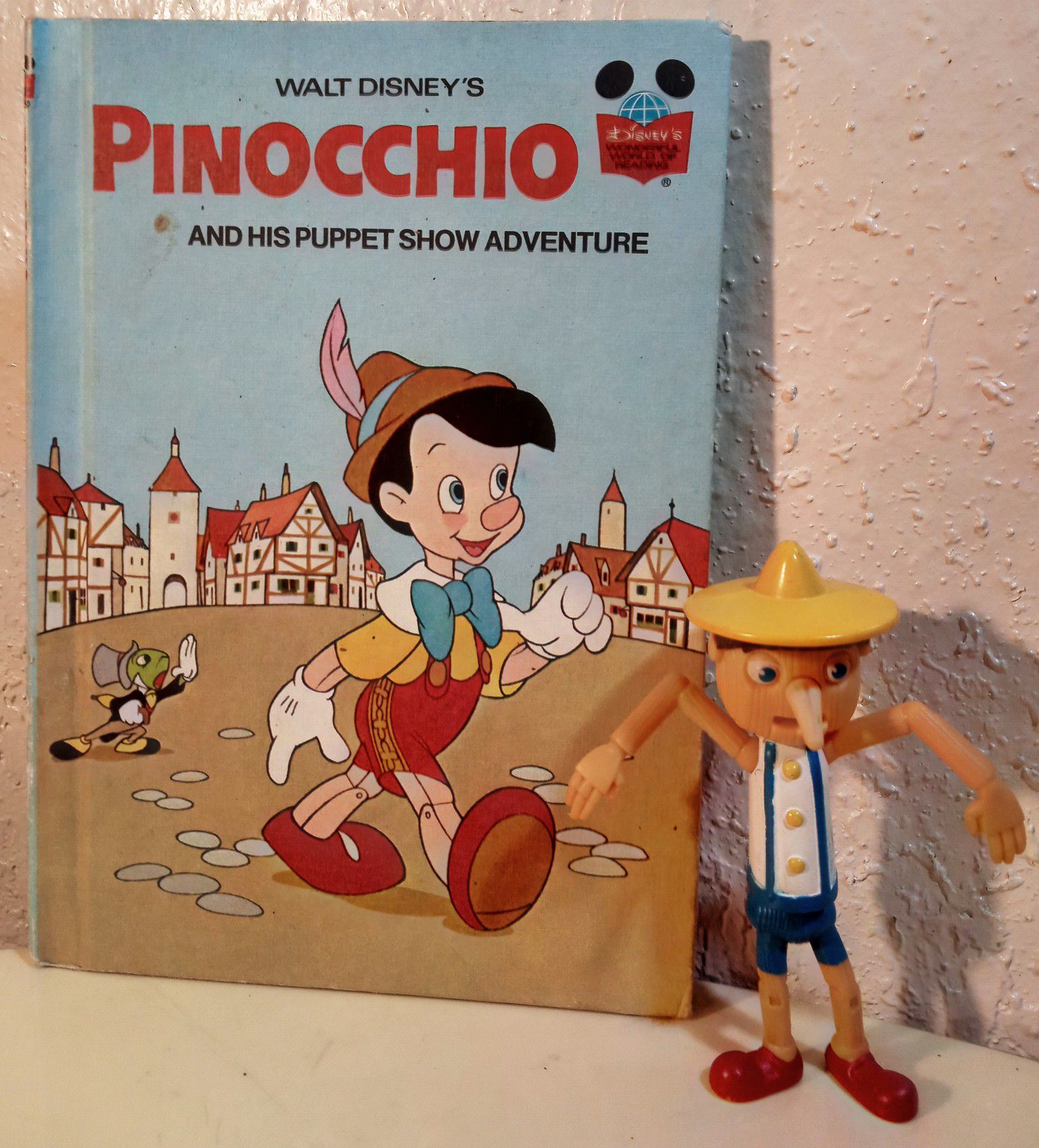Walt Disney's Pinocchio book & Figurine