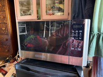 BLACK+DECKER Microwave Oven – 0.9 Cu. Ft. 900W Stainless Steel Countertop dorm bedroom great shape
