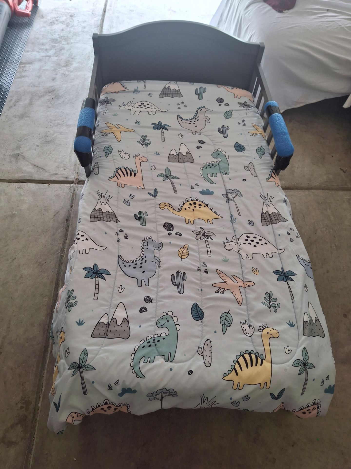 Toddler bed with mattress topper