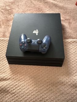Sony PlayStation 4 Pro Console with Controller
