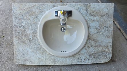 Bathroom countertop with Moen and Kohler