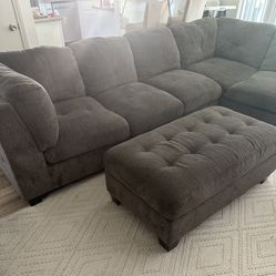 Grey Sectional With Storage Ottoman