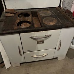 Cast iron stove with cast iron water heater