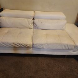 White Two-piece Sectional Very Heavy Mind Me Of The Jetsons It Got Silver Legs It's Very Sturdy And Good Condition Just Need Cleaning