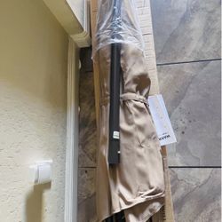 ☂️🌿 9 FT Outdoor Patio Umbrella – Dark Tan – Brand New! 🌿☂️ $35  📍 Pickup: S. Durango & 215 near IKEA  Base sold separate ( I have $25 fill up base