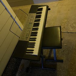 Casio Electric Keyboard and Chair - $20