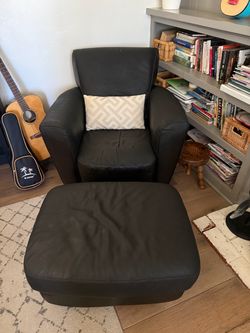 Leather club chair and matching ottoman