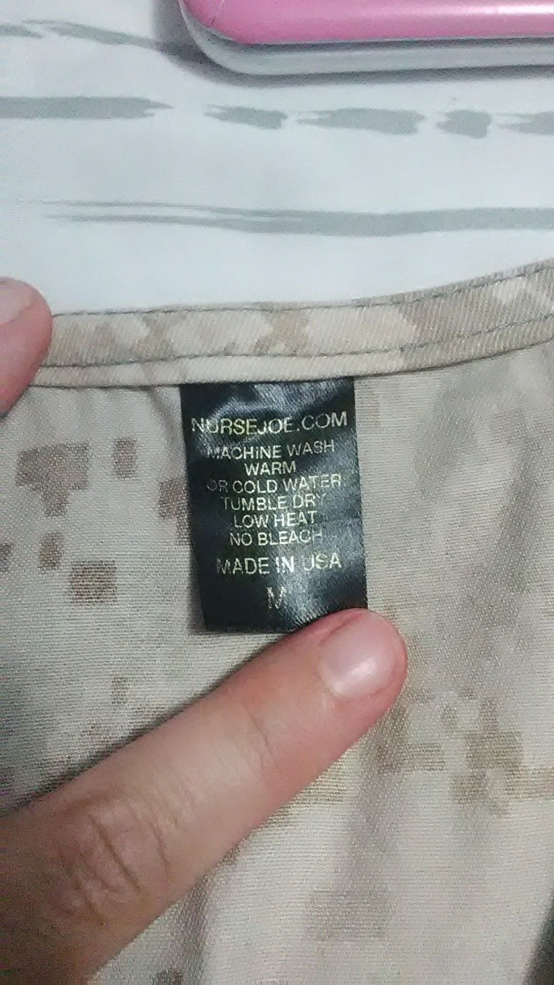 2 pair Carhartt multi- cargo pants and 1 nurse joe . com military Joe tan camouflage scrubs