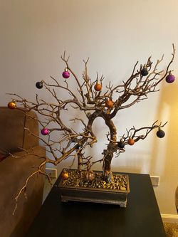 25" Halloween decor faux manzanita tree, an artful centerpiece featuring a dark-toned trunk and intricate, bare branches