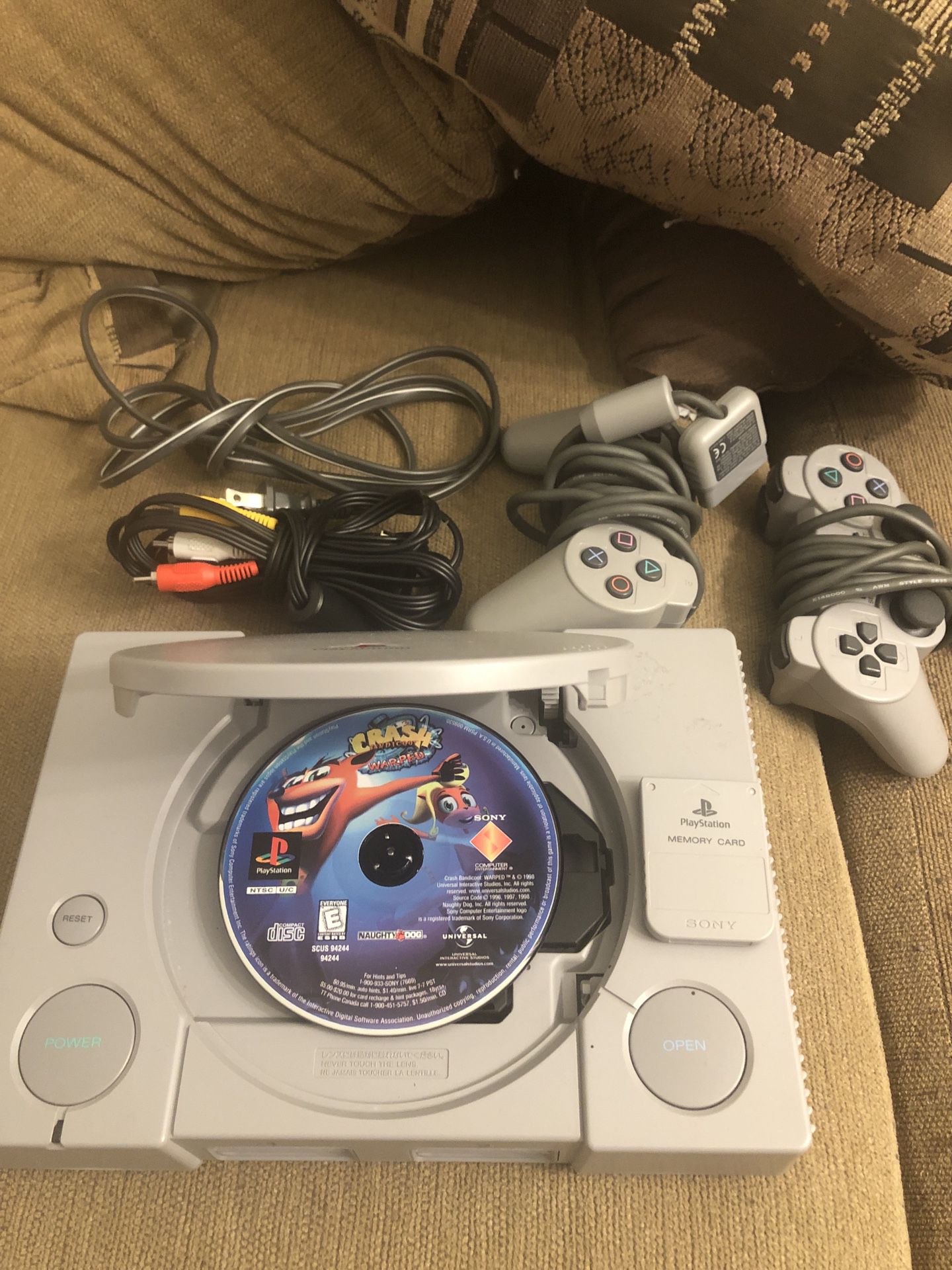 Sony PlayStation with 2 controllers, Memory Card and Crash Bandicoot