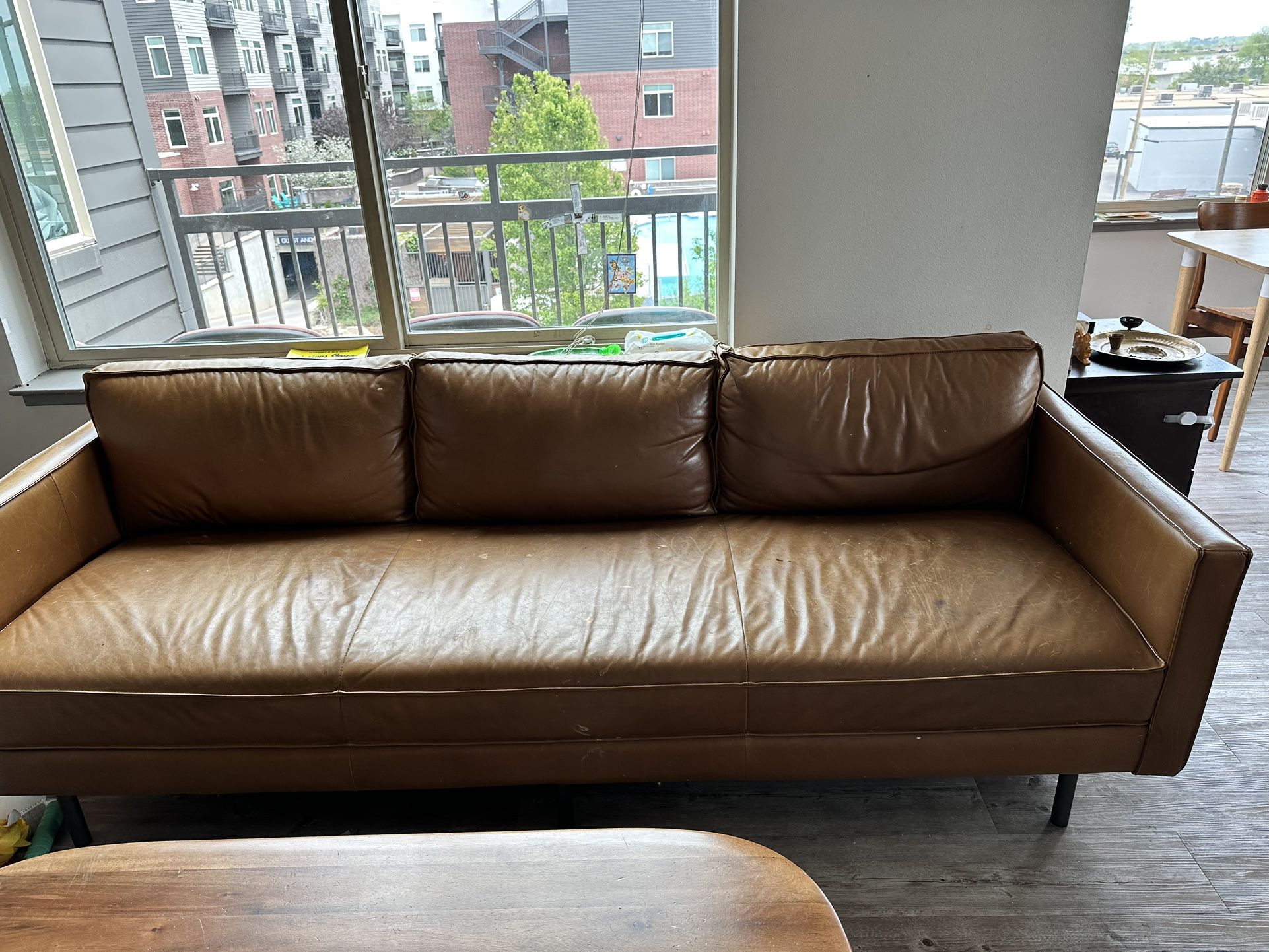 West Elm, Axel 89” reversible sectional/ leather couch with ottoman. 