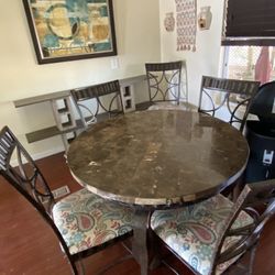 Inside table and chairs , good condition must pick up east mesa.75 Obo