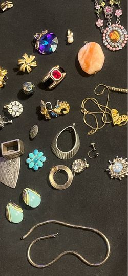 Vintage costume jewelry lot includes Avon ,Swarovski, Trifari