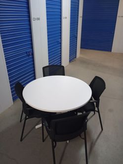 Round table and 4 chairs $ 300