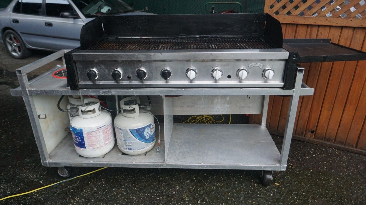 Bakers n Chefs 8 burner portable gas grill, with built in sink and a 2.