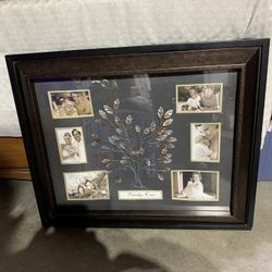 A Big Photo Frame That Says Family