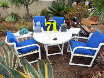 Vintage patio set with blue cushions