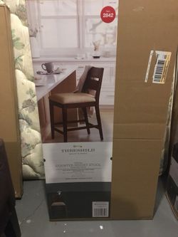 Brand new brown stool with box never opened