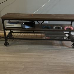 Home Depot Juklen 54 in. Medium Oak Wood TV Stand Fits TVs Up to 65 in. with Wheels