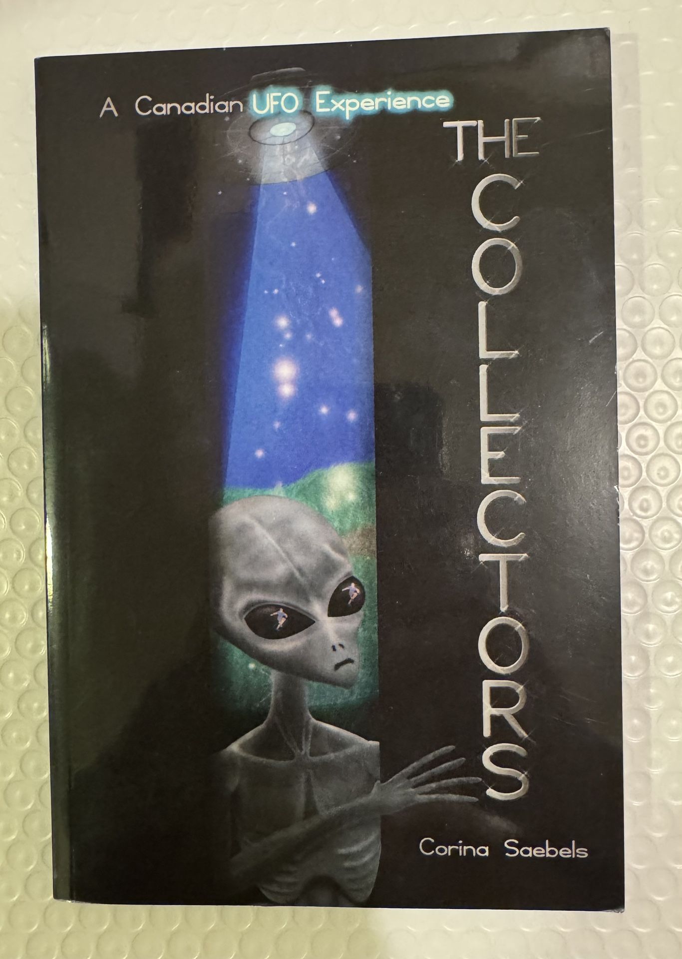 THE COLLECTORS: A CANADIAN UFO EXPERIENCE By Corina Saebels -paperback