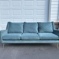 Beautiful West Elm Paidge Sofa in teal performance velvet with brass legs. Freshly cleaned, very comfortable, and in excellent condition. Stylish mode