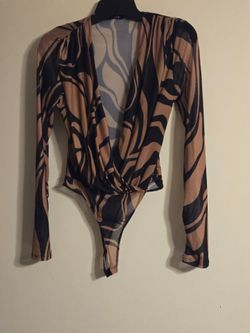 Tan  and black  blouse with bottom snaps