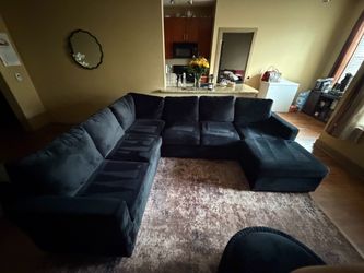 Black U Shaped sectional sofa