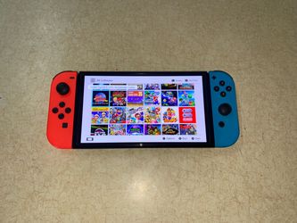 NINTENDO SWITCH OLED with 125 SWITCH GAMES and 7500 RETRO GAMES INCLUDED