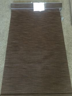 Custom roll up shades and honeycomb binds
