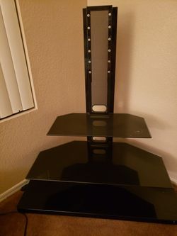 Tv Stand $50 and assorted bathroom decor $25