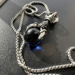 Dragon claw blue ball pendant