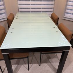 Dining Room Table Also Opens Up And Becomes Bigger Or Smaller How Ever You Want. With The Four Chairs. $650