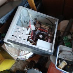 Computer parts keyboard Mouse. Old towers old computers.