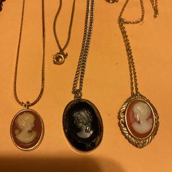 3 Vintage Necklaces With Cameo Pendants…2 Gold Necklaces 1 Silver Necklace And Necklaces With Lockets
