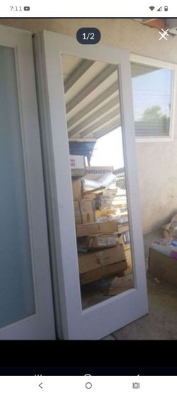 28x80 interior mirror door available now no frame , slab only